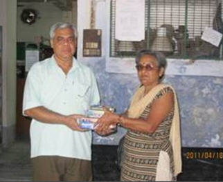 Distributing Prabhupada books to relatives