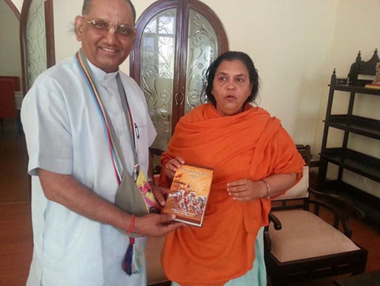 Smt Uma Bharti, Minister for water resources, River development and Ganga rejuvenation of India received Bhagavat Gita As it is