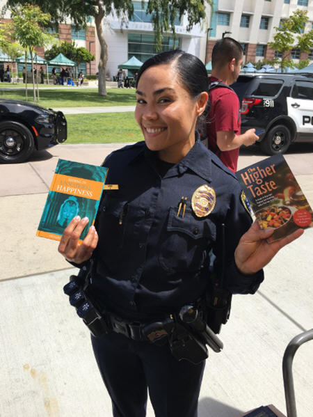 Pious police and security officers get books